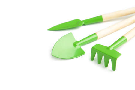 Green gardening tools isolated on white background. Close up. Top viewの写真素材