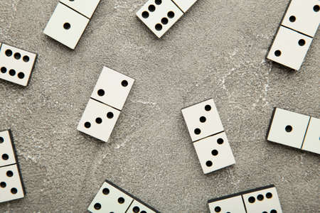 Domino pieces on the gray background. Top viewの写真素材