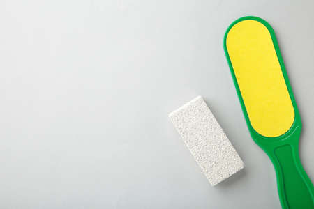 Pumice for legs on gray background. Foot skin care tool. Pumice for a beauty salon. Top viewの写真素材