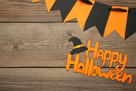 Inscription Happy Halloween on gray wooden background. Top viewの写真素材