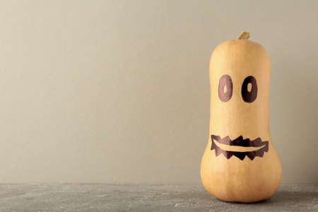 Halloween Pumpkin, Scary Jack on gray background. Top viewの写真素材