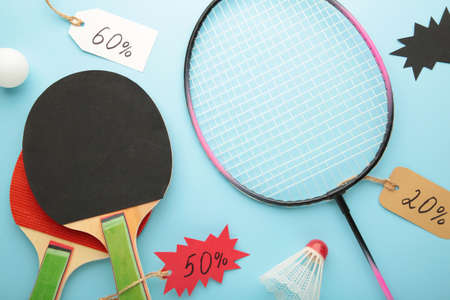 Sports equipment for sale on blue background. Black fridayの写真素材