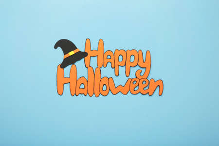 Inscription Happy Halloween on blue background. Top viewの写真素材