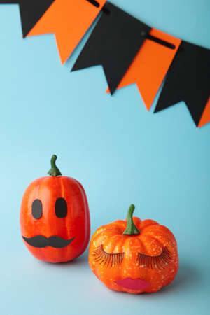 Halloween pumpkin with make up. Minimal Holiday season concept background. top viewの写真素材