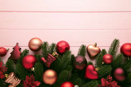 Christmas or New Year red decoration on pink background. Top viewの写真素材