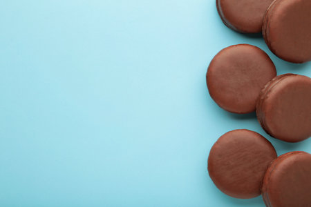 Choco pie chocolate coated snacks on blue background. Top viewの写真素材