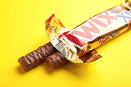 Long Milk Chocolate Bars With Caramel Filling On White Background. Nikolaev, Ukraine - December 19, 2021のeditorial素材