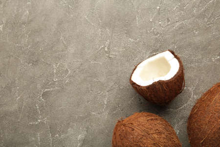 Fresh coconut on gray background. Top view.の写真素材