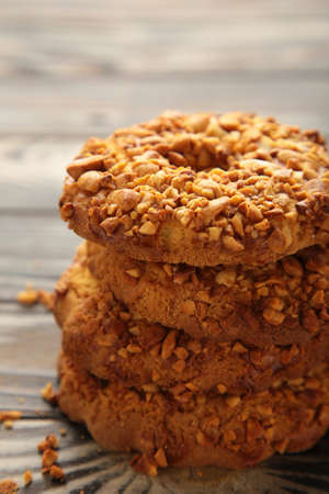 Peanut cookies on brown wooden background. Bakery products