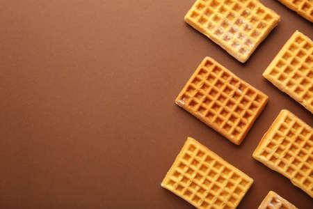 Waffles on brown background with copy space. top viewの写真素材