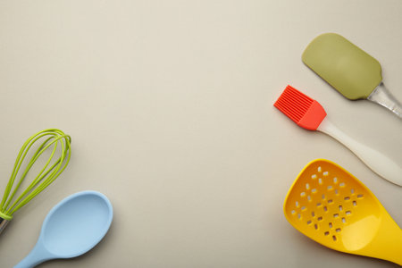 different kitchenware on a gray background top view. cooking appliances.の写真素材