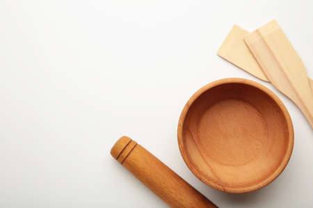 Wooden kitchen utensils on white background. top viewの写真素材