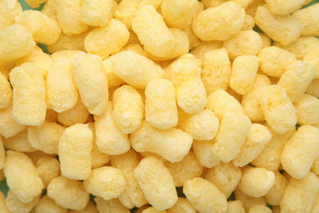 Yellow corn sticks close-up. backgrounds and textures. top view