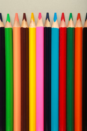 Background from color pencils on gray paper. top view.の写真素材