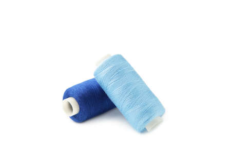 Blue sewing thread isolated on white background, top viewの写真素材