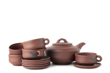 Clay teapot with cups isolated on white background. top viewの写真素材