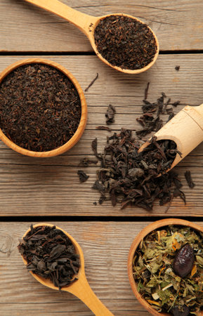 Assortment of dry tea on gray wooden background. top viewの写真素材