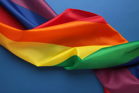 The rainbow flag (LGBT) on blue background. top view. love concept.の写真素材
