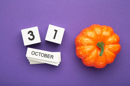 Happy Halloween day with pumpkin and 31 October calendar. Trick or Threat, Hello October, fall autumn, Festive, party and holiday concept. Top viewの写真素材