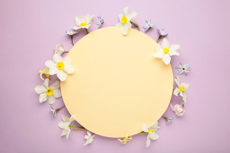 Flowers composition. Spring blue flowers on purple background. Top viewの写真素材