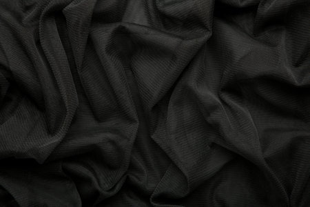 Black linen fabric texture. Black textile background. Draped raw organic cloth black pattern, banner. Top viewの写真素材