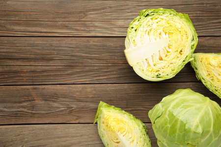 Half of cabbage on gray wooden background. Top viewの写真素材