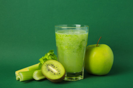 Green smoothie in glass made from kiwi, celery, apples. Detox concept, healthy food, diet, vegetarian. Top viewの写真素材