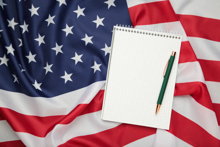 American Flag on white background and space for Your congratulatory inscription. Greeting card. Studio shot. Congratulations for family, loved ones, relatives, friends and colleaguesの写真素材