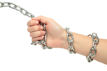 Hands are chained in chains isolated on white background. Top viewの写真素材