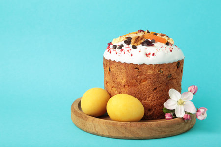 Traditional easter cakes with colorful sprinkles, with eggs, a bunny figurine, and spring flowers on...