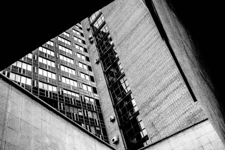 A close up of a tall building. Window. Geometry. Skyの写真素材
