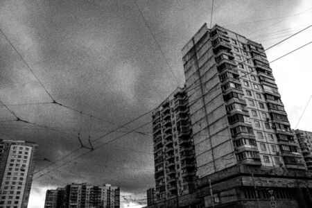 A tall building in a city. Window. Geometry. Skyの写真素材