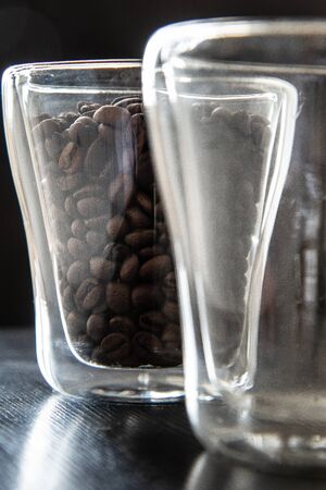 roasted coffee beans in a glass for breakfastの写真素材