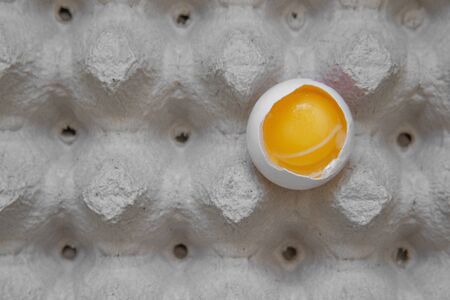 Close up view of raw chicken eggs in a box