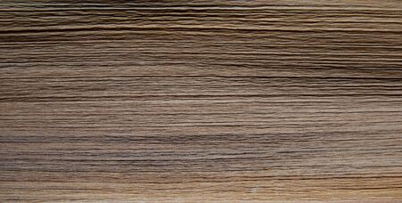 Dry palm leaf. Wallpaper. Wood texture. Color wenge. Warm brown color. Old treeの写真素材