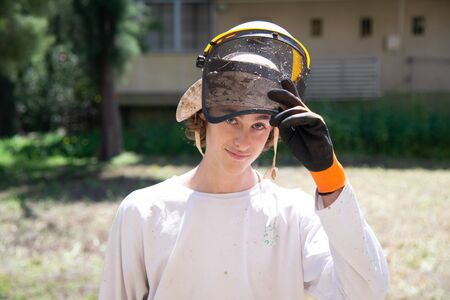 Mow the grass. Gardening, spring cleaning. Garden and grass care.の写真素材