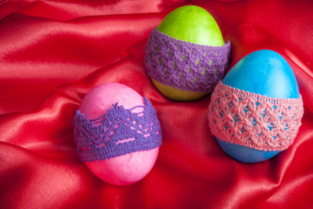 Easter eggs on red silkの写真素材