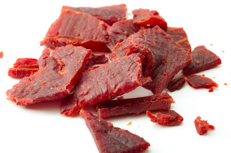 High protein diet and food that is high in sodium and salt concept theme with close up on beef jerky...