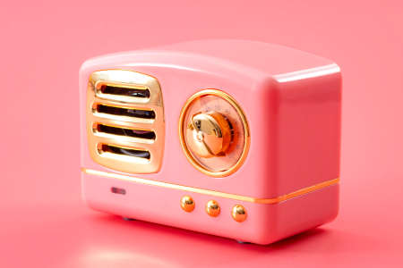 Vintage technology, 70s audio equipment and live music sound system concept theme with retro radio tuner with metal chrome knob isolated on pink backgroundの写真素材