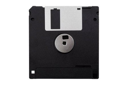 Obsolete data storage technology, retro digital medium and nostalgia concept with a tilted floppy...
