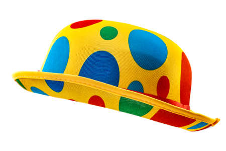 Humorous headgear concept with floating clown bowler hat in red, blue, green and yellow colors  isolated on white background with clipping path cutout using the ghost mannequin techniqueの写真素材