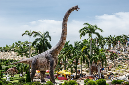 PATTAYA, THAILAND - AUGUST 13, 2017 : People visit dinosaur Valley at Nong Nooch Garden Pattaya, Thailandのeditorial素材