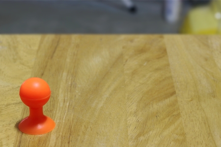 Select focus, rubber suction cup stand on floor wood