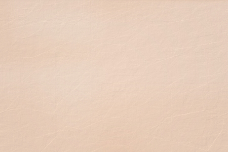 Light orange watercolor paper texture backgroundの写真素材
