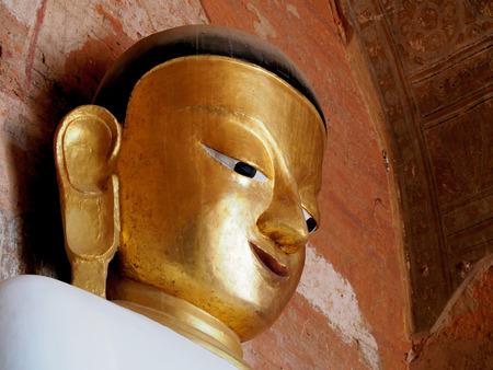 Golden buddha face in Bagan, Burmaの写真素材