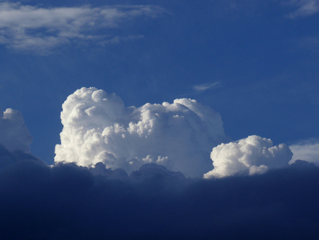 Impressive dark sky with beautiful white clouds