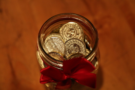 Golden abbstract coins background close up
