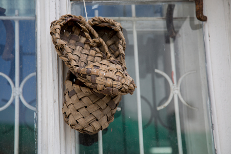Pair bast shoes window backgroundの写真素材