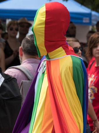 Rainbow flag covering man August 2017 gay pride Vancouver Canada BCのeditorial素材