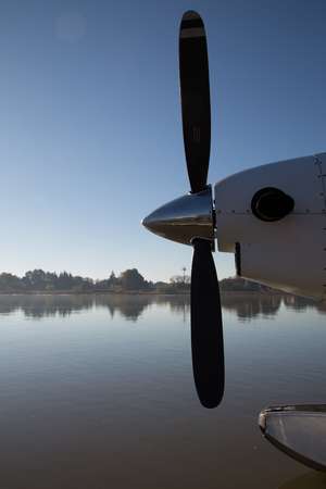 Airplane propeller closeup water surface copy space background